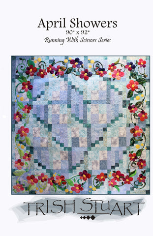 pattern cover shows the whole queen size strip pieced quilt with the fusible applique happy flowers bordering all four sides.